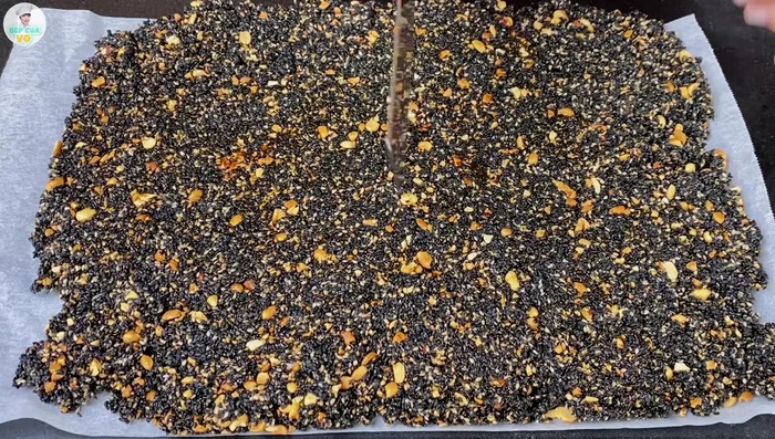 While still warm, cut the candy into bite-sized pieces. Let it cool completely to become brittle.