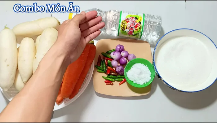 Prepare the pickling liquid: In a pot, combine sugar, vinegar, and remaining salt. Bring to a boil, then turn off the heat and let it cool completely.