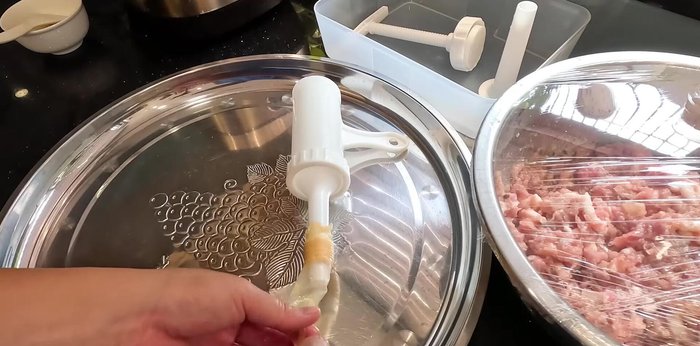Stuff the meat mixture into the sausage casings using a stuffing kit or plastic bottle. Poke small holes to release air and prevent bursting during cooking.