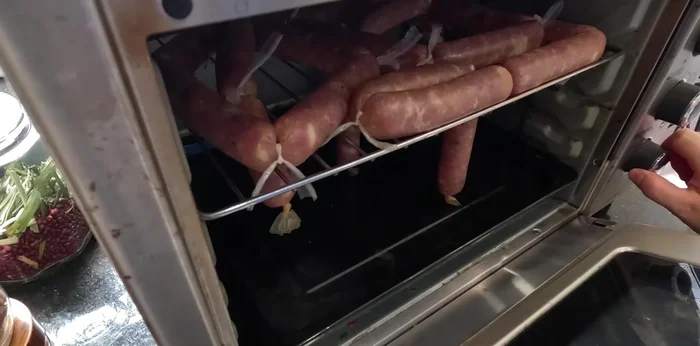 Dry the sausages: Hang to dry in a well-ventilated area or bake in an oven at 70°C for 4-5 hours, ensuring airflow and poking holes for moisture release.