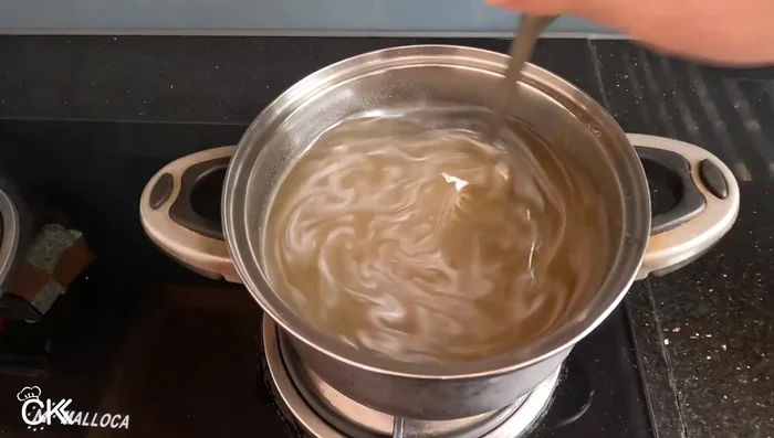 Cook the jelly: Cook the mixture over low heat for 15-20 minutes, stirring occasionally, until the jelly is cooked and expanded.