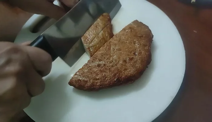 Prepare the grilled meatloaf, sausage, and ribs. Reheat if necessary.