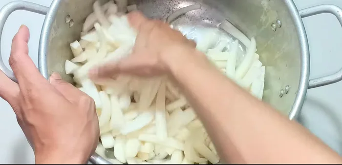 After 4 hours, squeeze the radishes gently to check for softness. Rinse the radishes thoroughly with water several times to remove the salt and bitter taste.
