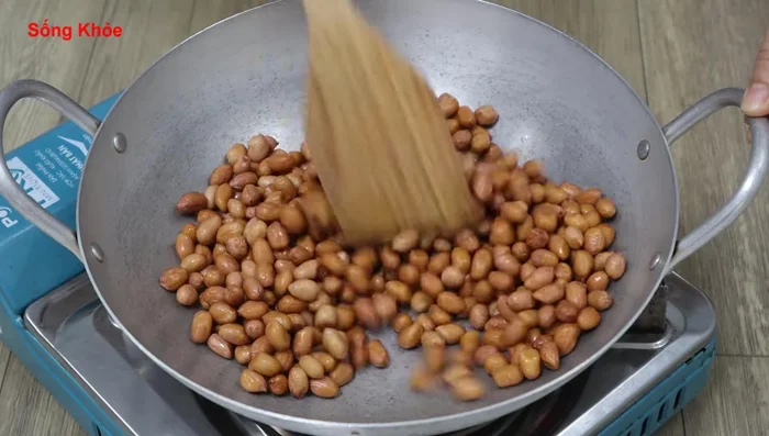 Roast peanuts until golden brown and crispy. Don't leave them too long to prevent the shells from releasing resin.