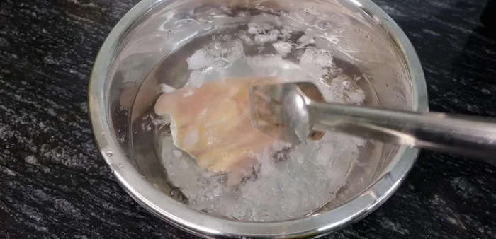 Transfer pig ears to a bowl of cold water for 5 minutes to make them crispier. (140.44)