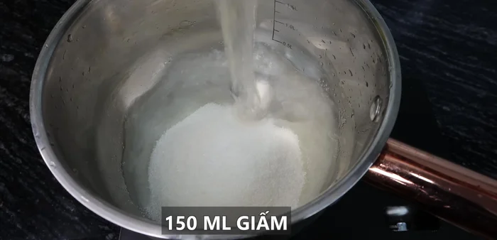 Prepare the sugar dipping sauce: Boil sugar, vinegar, and salt until dissolved. Let cool. (520.68)