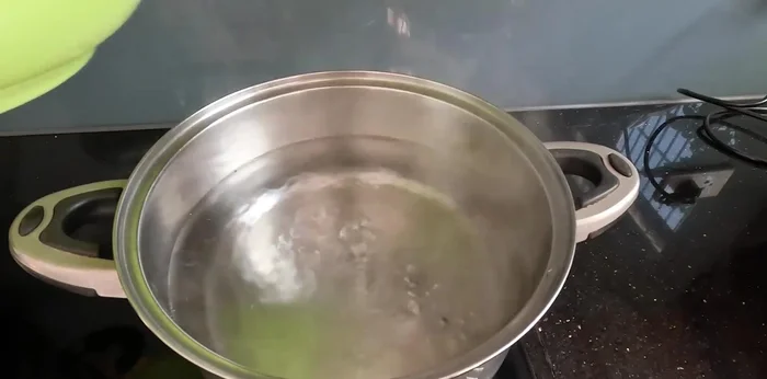 Boil the tofu pieces in a pot of water for about 5 minutes until cooked.