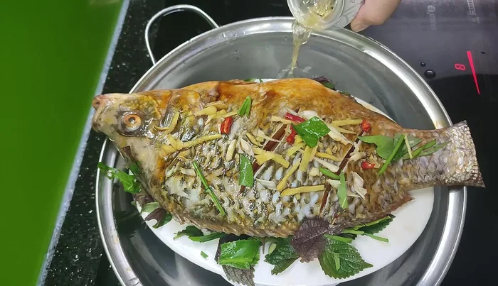 Steam for 30-40 minutes, or until the fish is cooked through (you can check by poking it with chopsticks; it should flake easily). [124.2]