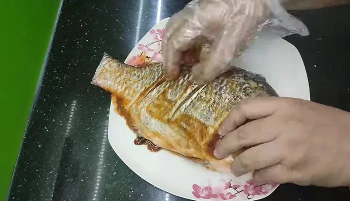 Rub the marinade into the inside and outside of the fish to ensure it absorbs the spices. [38.68]