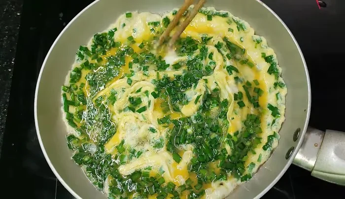 Fry the eggs until cooked. Avoid overcooking to prevent dryness.