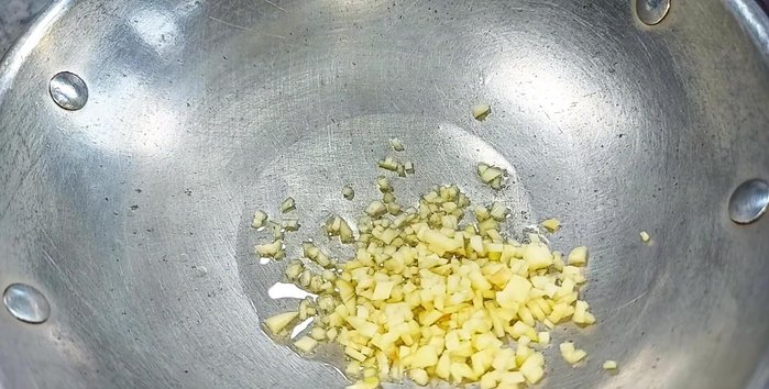 Sauté minced garlic (or substitute with baro, coriander stalks, or celery if vegetarian and avoiding garlic).