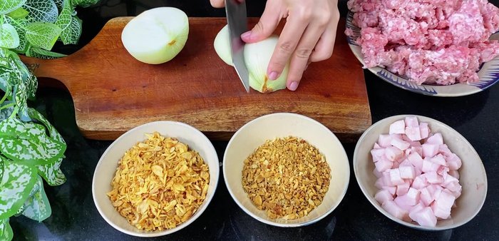 Prepare aromatics: Finely chop garlic and onions.