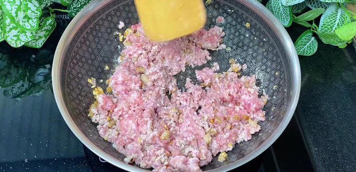 Cook the meat: Add ground meat, seasoning powder, sugar, fish sauce, and oyster sauce. Stir-fry until cooked.