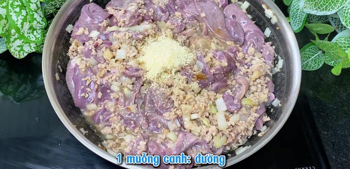 Season and add peanut butter: Add more fish sauce, seasoning powder, sugar, MSG, and oyster sauce. Stir well, then add peanut butter. Stir until melted, then turn off the heat.