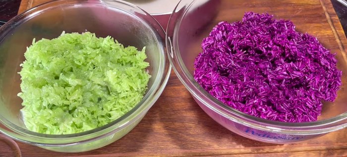 While the coconut milk is still hot, pour it evenly over the steamed sticky rice and stir gently to combine. Cover and let it sit for 15 minutes, stir, then cover again and let it sit for another 45 minutes to 1 hour, or until the rice is drier and glossier.