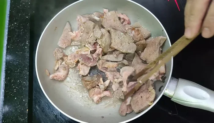 Stir-fry until the liver is cooked through. Do not undercook.