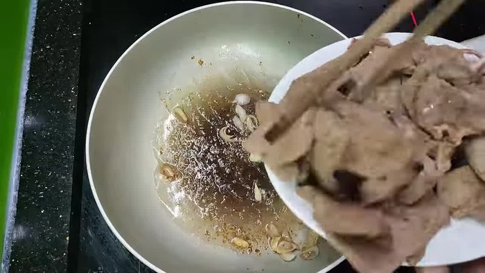 Blanch the beef liver with hot water, then rinse it clean.