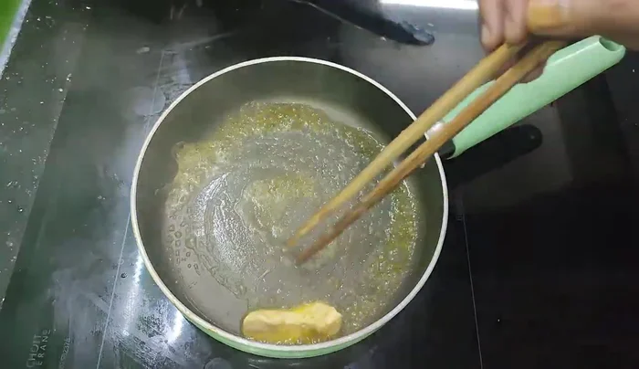 Prepare the pan bread: Put an empty pan on the stove. Add butter to the pan (98.439).