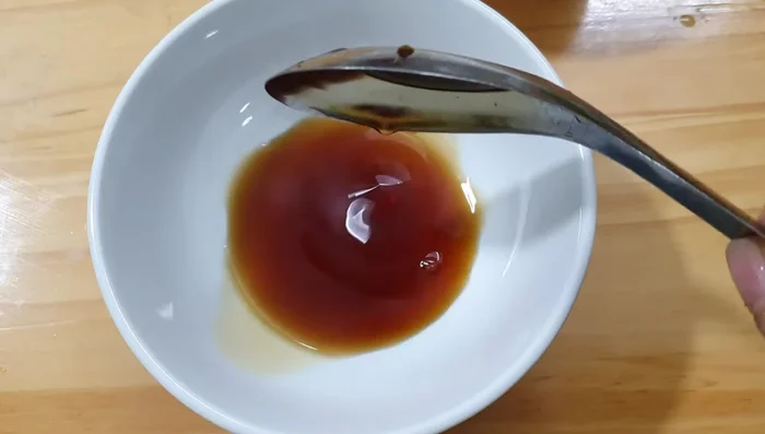 Prepare the salad dressing by mixing fish sauce, sugar, lemon juice, chili sauce, minced garlic, and minced chili.