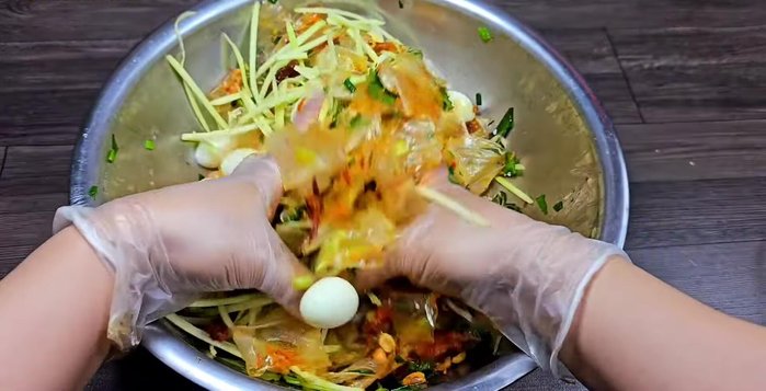 Add the quail eggs, coriander, and lemons. Mix gently again. Serve immediately.