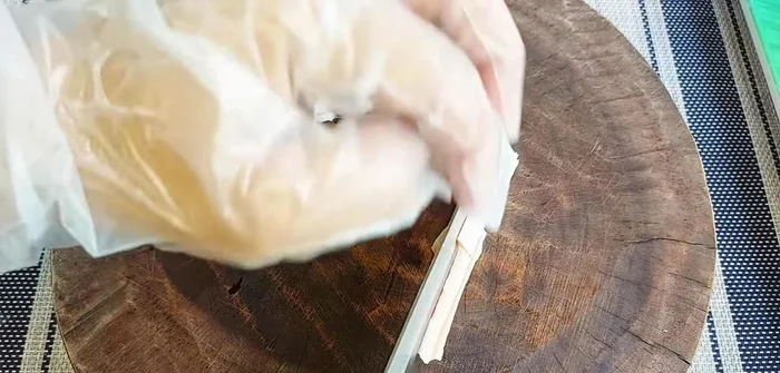 Prepare the crab sticks: Cut the crab sticks into thirds.