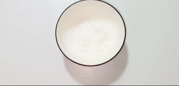In a bowl, combine sugar, sweet pepper, Korean chili powder, fish sauce, soy sauce, and water. Stir until well dissolved.