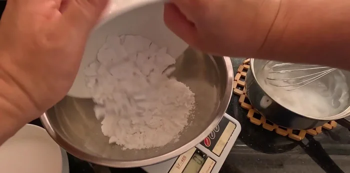 Combine remaining ingredients: Add tapioca flour, remaining rice flour, coconut milk, water, sugar, vanilla, salt, yeast, and baking powder to the starter dough. Mix until even.