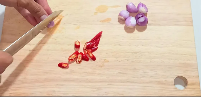 Peel, wash, and slice the purple onions.
