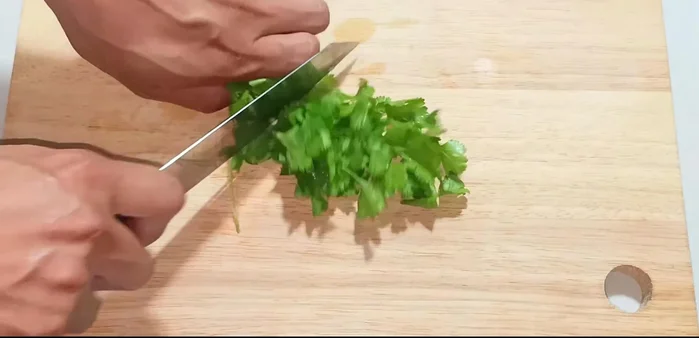 Wash and chop the coriander.