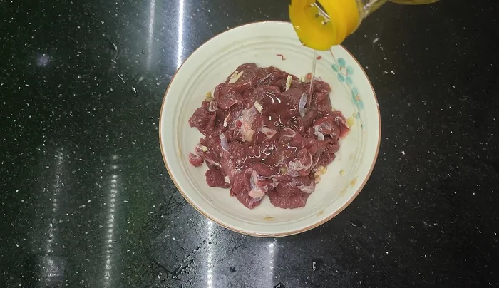 Marinate the beef for at least 20 minutes, or preferably longer (overnight in the refrigerator for best results). (66.4)