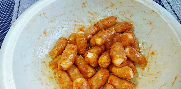Grill the meatballs on a grill, air fryer, non-stick pan, or stone pan until golden brown and slightly dry.