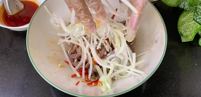Add the onions: Add the drained onions and mix well.