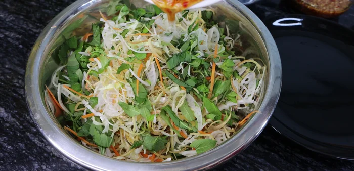 Mix salad with prepared dressing.