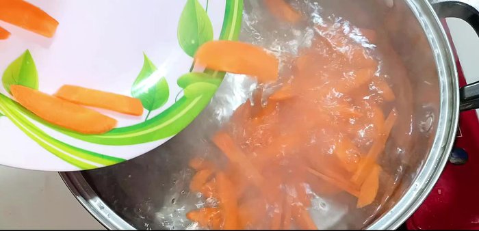 Boil the carrots for 30 seconds to soften them before stir-frying. Then, drain and rinse the carrots.