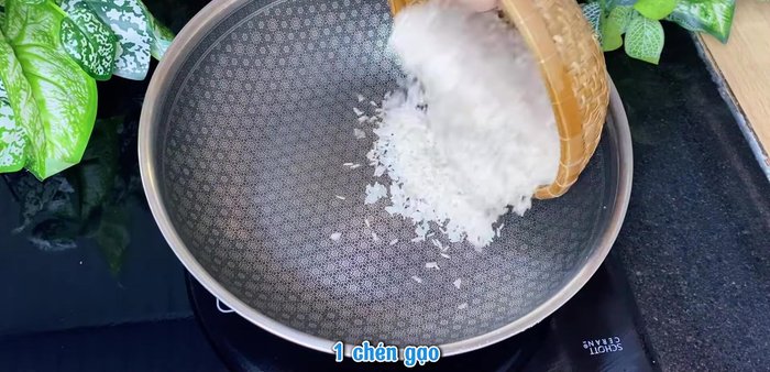 Roast rice in a pan until golden and fragrant.