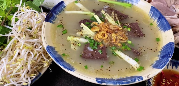 Serve hot with vermicelli and a dipping sauce (e.g., fish sauce).