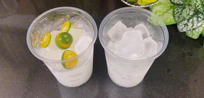 Add ice to two glasses. Divide the tea mixture equally between the two glasses.