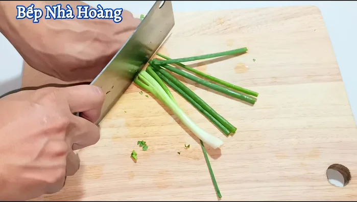 Finely chop the green onions. Set aside for later.