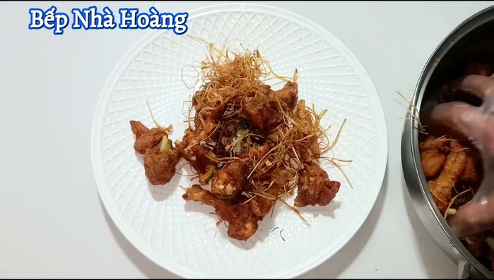 Arrange the chicken on a plate, garnish with the fried garlic and shallots.