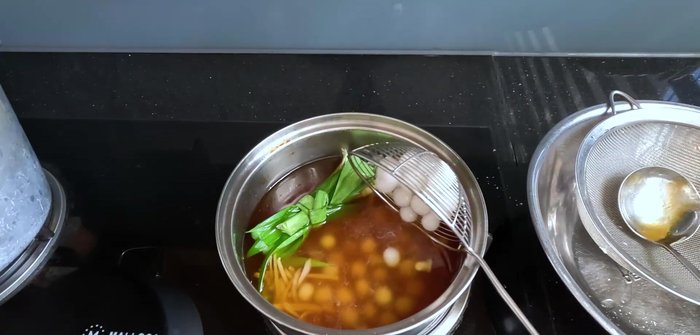Add the cooked tapioca pearls to the sugar water and let it cool completely. Refrigerate for several hours.