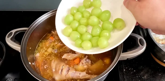 Add the fried grapes and cook for about 5 minutes. Add green onions and cook for another 3-5 minutes.