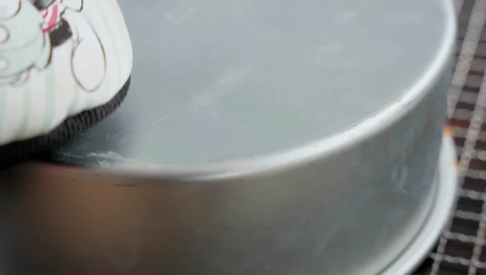 Invert the cake onto a wire rack to cool completely.