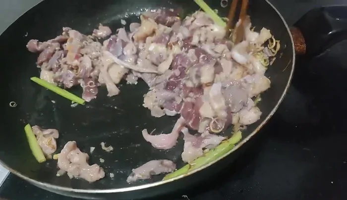 Add garlic when the goose is almost cooked.