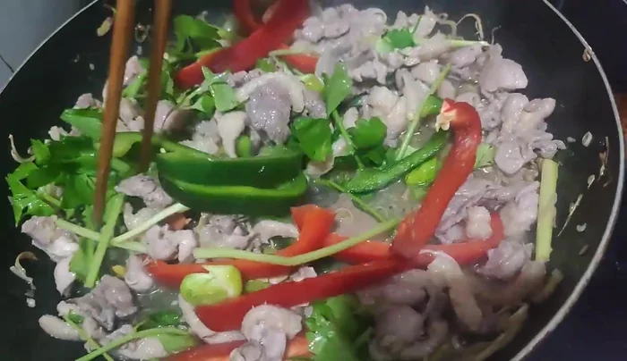 Stir-fry until cooked. No need to add more spices if marinated properly.