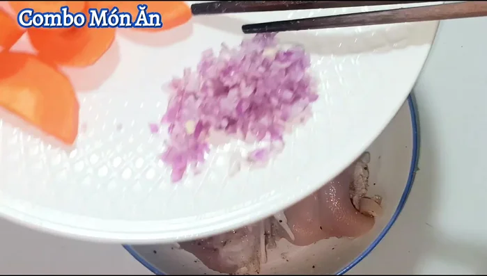 Add chopped shallots to the water before adding the marinated pork leg.