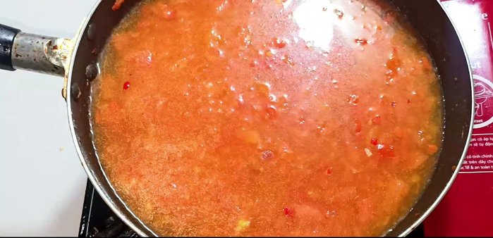 Add coconut water, sugar, MSG, seasoning powder, salt, pepper, and fish sauce. Stir well.