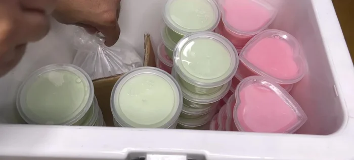 Incubate both yogurt mixtures: Place the jars in an incubation box. For extra warmth, add a bag of 5-60 degree Celsius hot water wrapped in paper or cloth. Cover with a towel. (365.52)