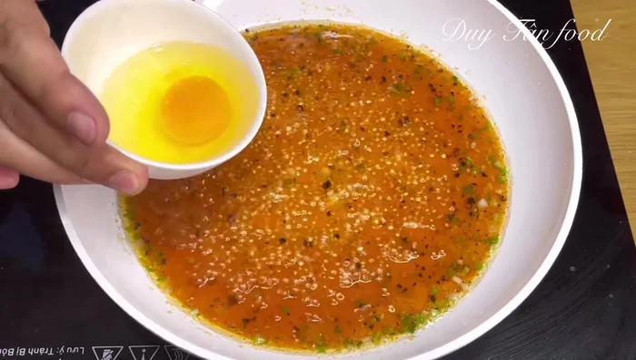 Add eggs: Gently add the eggs (whole or beaten, according to preference) to the sauce. Reduce heat to low.