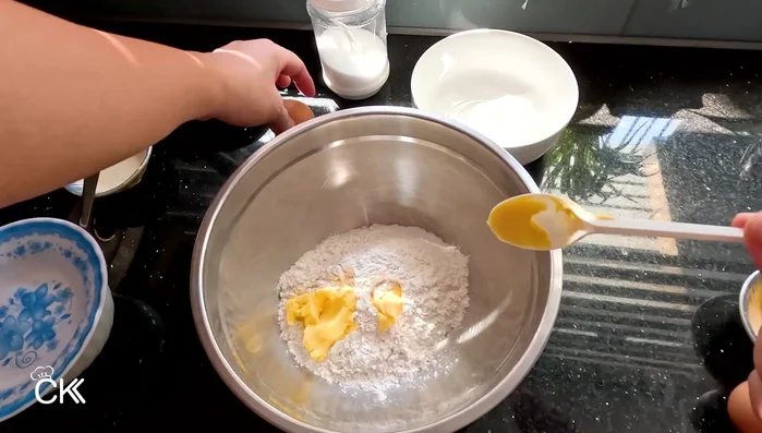 Add wet ingredients: Add milk, butter, sugar, and eggs to the flour. (177.76)