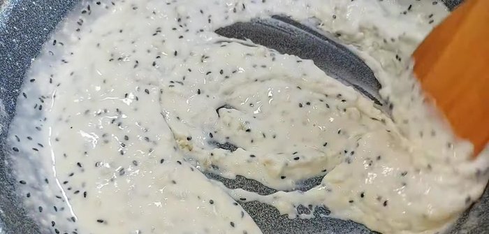 Continue stirring until the dough is fully cooked and no longer sticks to the pan. The dough will become clear and slightly dry.